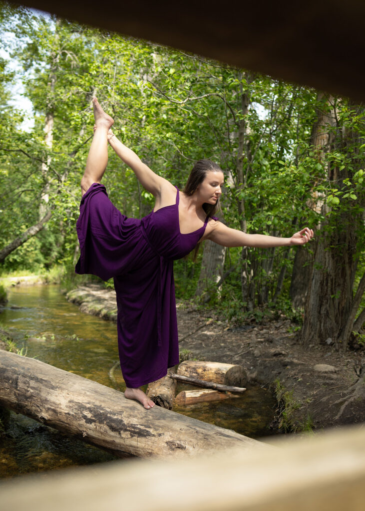 stephanie doin a yoga pose for well-being in nature
